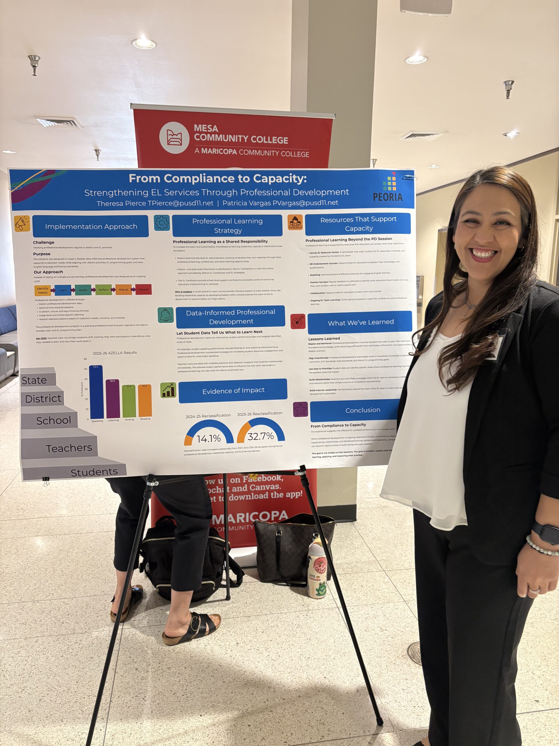 Woman standing in front of research poster
